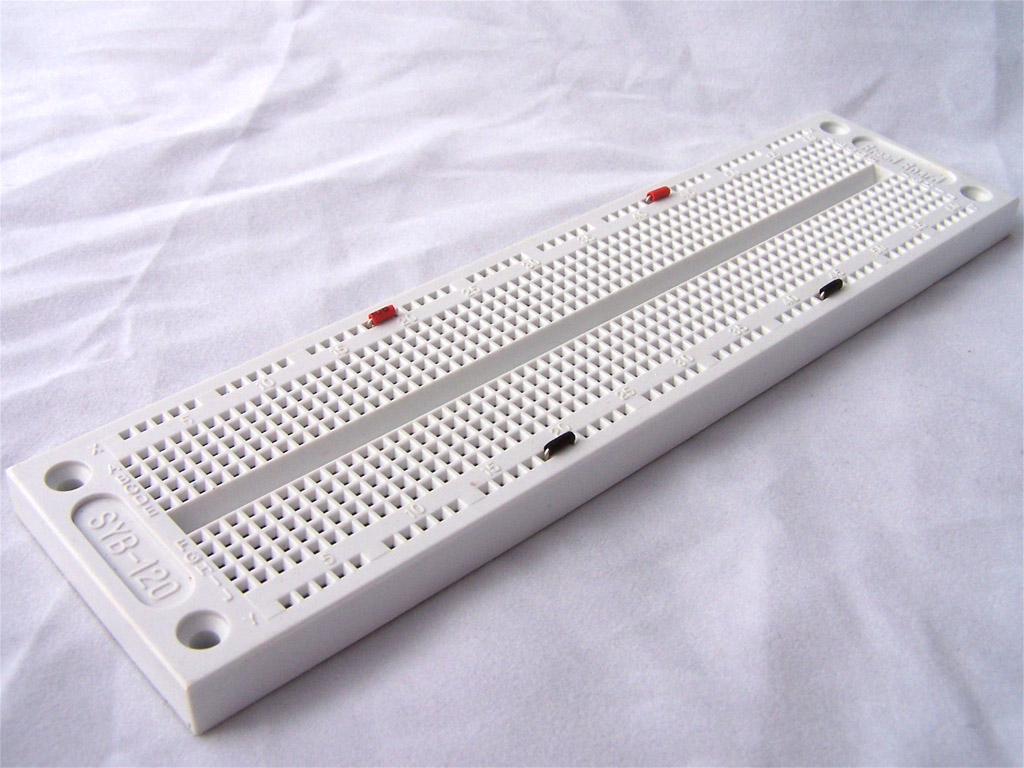 breadboard with jumpers on power buses